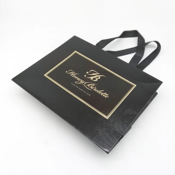 Black Foil Stamped Apparel Paper Bag with Ribbon Handles Black Foil Stamped Apparel Paper Bag with Ribbon Handles