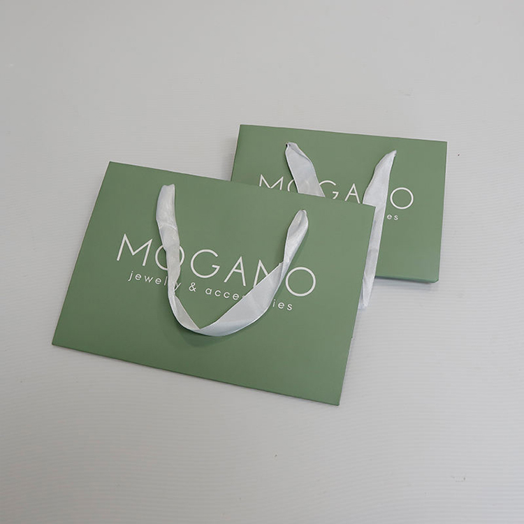 Luxury paper shopping bags with custom printed logos