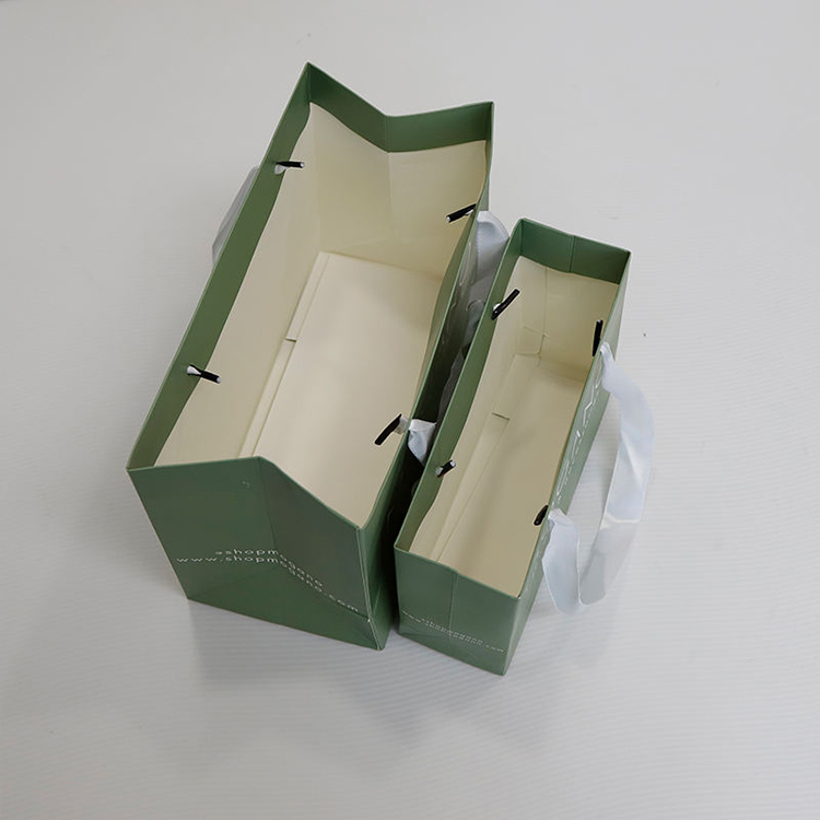 Luxury paper shopping bags with custom printed logos